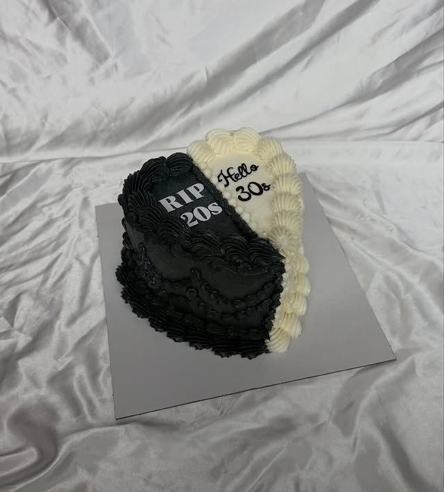 Black and cream buttercream heart cake reading “RIP 20s, Hello 30s” with Lambeth piping, Austin TX
