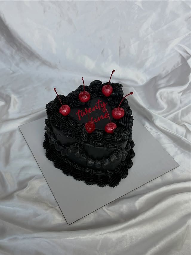 Black heart cake topped with fresh cherries, Austin TX